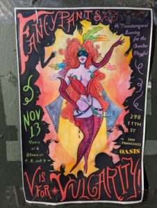 colorful art nouveau poster taped onto a light pole of a sexy masked lady in a bustier and red stockings for an event called fancy pants