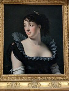 oil painting of a lady in a low cut dress with a huge neck ruffle