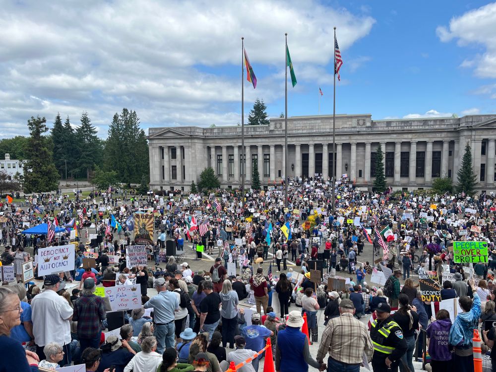 another big crowd in front of a government building, in olympia